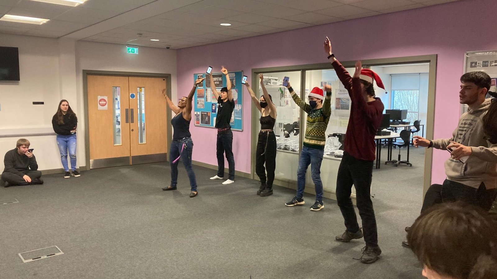 Male and female students dancing